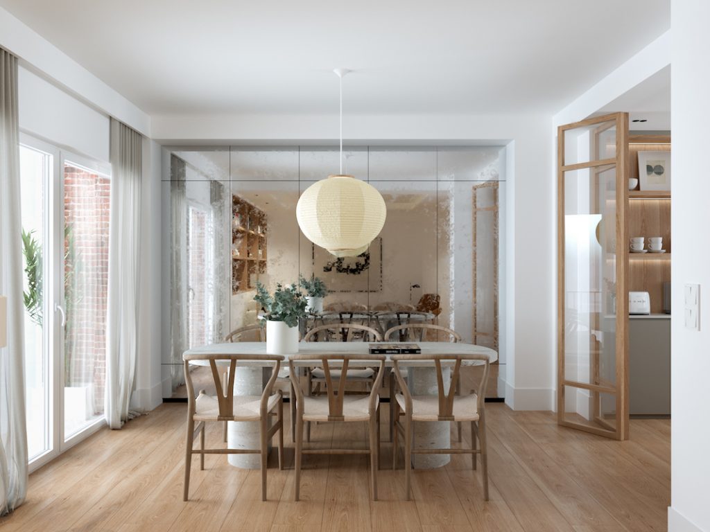 mesa de comer con espejo al fondo para más espacio